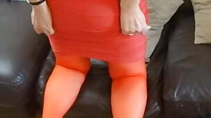 50 year old Mrs Sandie in red stockings and suspenders.